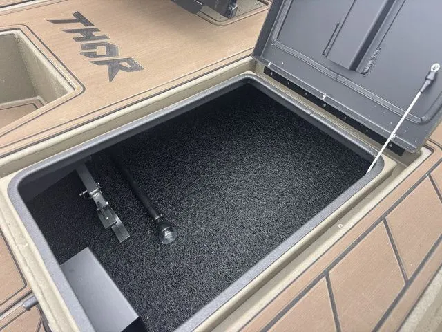 Slide: The Image of Thor Boats 1860 Lake Hammer Elite 2026 storage compartment open. - 17