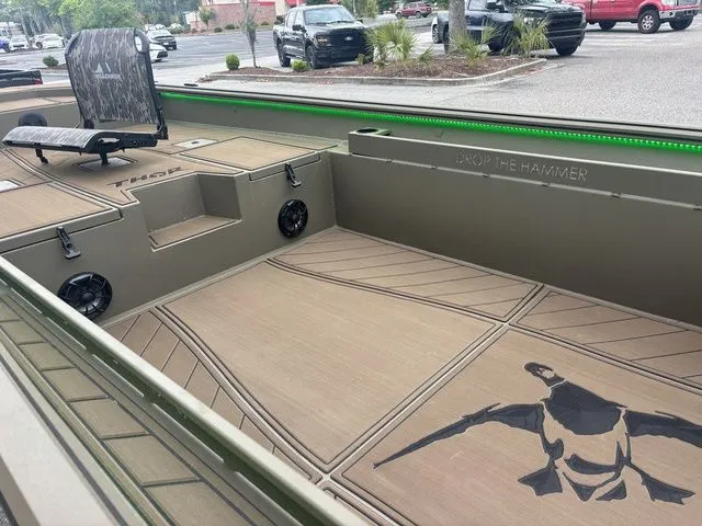 Slide: The Image of Interior of Thor Boats 1860 Lake Hammer Elite 2026 with seating and speakers. - 23