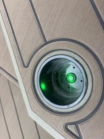 Slide: The Image of Close-up of Thor Boats 1860 Lake Hammer Elite 2026 with green light. - 25