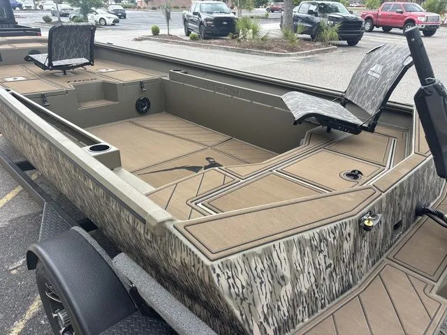 Slide: The Image of 2026 Thor Boats 1860 Lake Hammer Elite with camouflage design and spacious deck. - 5