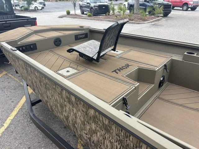 Slide: The Image of 2026 Thor Boats 1860 Lake Hammer Elite on a parking lot. - 7