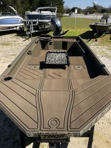 Slide: The Image of Thor Timber Hammer 1860 Tiller Elite 2026 boat on trailer. - 3