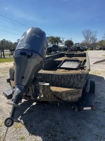 Slide: The Image of 2026 Thor Timber Hammer 1860 Tiller Elite boat with outboard motor. - 6