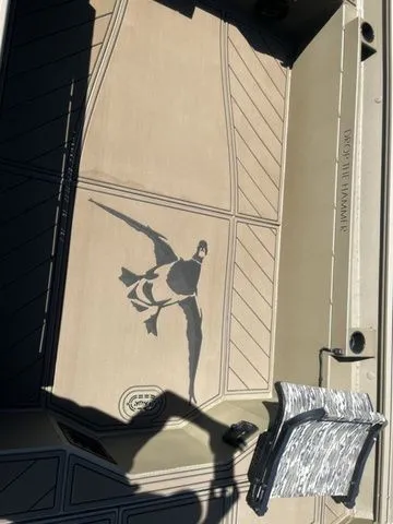 Slide: The Image of Thor Timber Hammer 1860 Tiller Elite 2026 with duck design on the floor. - 7