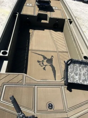 Slide: The Image of Thor Timber Hammer 1860 Tiller Elite 2026 with duck motif on the floor. - 9