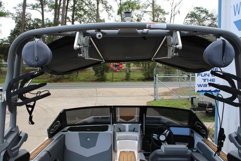 Slide: The Image of 2023 Nautique Super Air Nautique GS20 interior with wakeboard racks and speakers. - 10