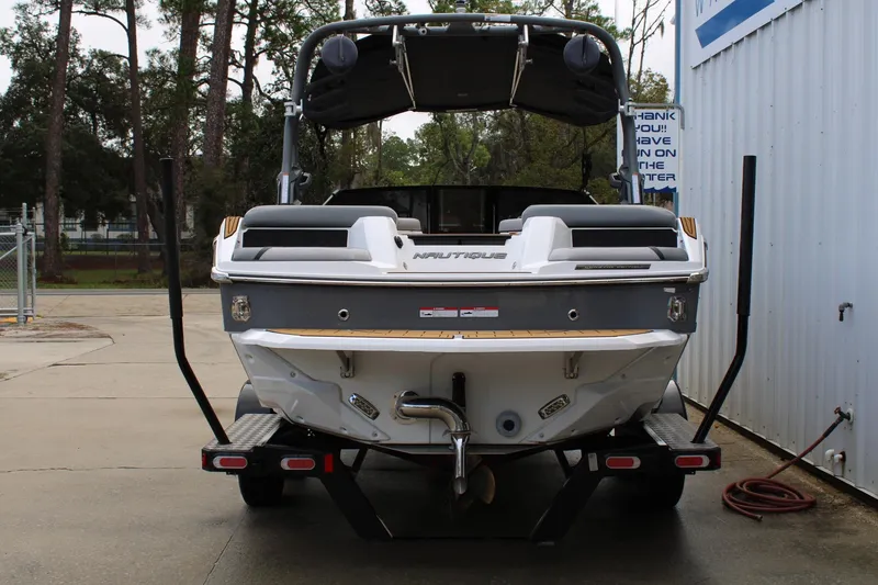 Slide: The Image of 2023 Nautique Super Air Nautique GS20 boat on trailer, rear view. - 6