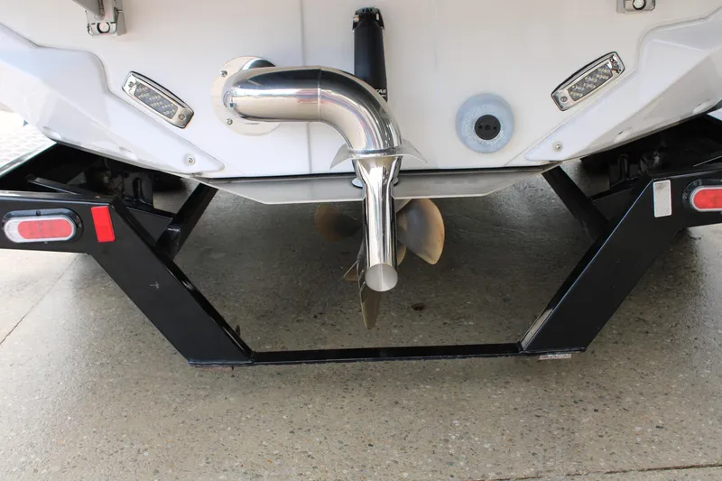 Slide: The Image of 2023 Nautique Super Air Nautique GS20 boat stern with propeller and exhaust system. - 8