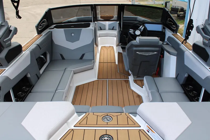 Slide: The Image of 2023 Nautique Super Air Nautique GS20 interior with sleek seating and modern dashboard design. - 9