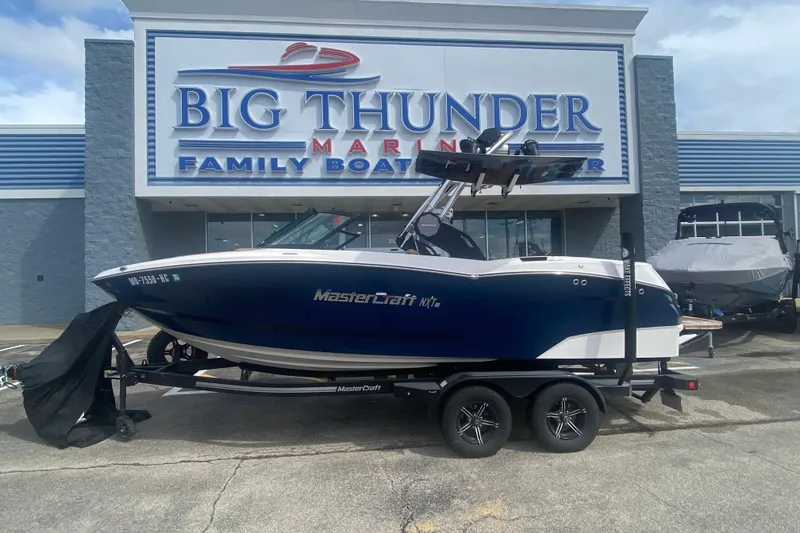 The Image of 2023 MasterCraft NXT21 boat displayed at Big Thunder Marine dealership. - 1