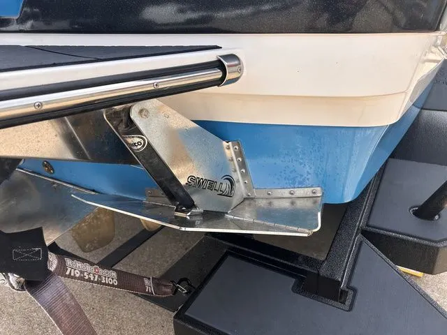 Slide: The Image of Close-up of a 2018 Supra SL boat with Swell system. - 10
