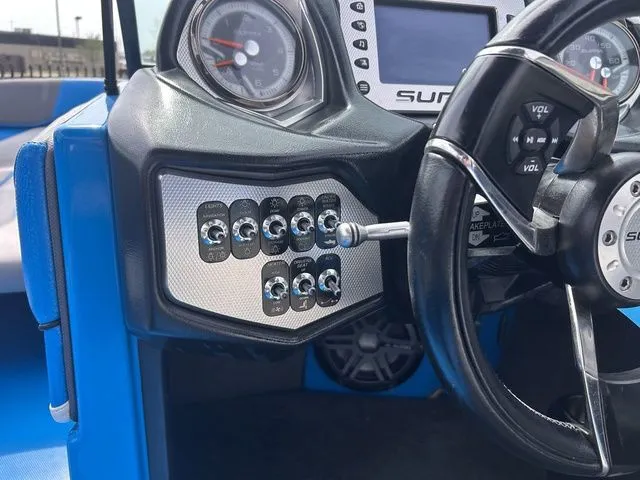 Slide: The Image of Dashboard of a 2018 Supra SL with switches and steering wheel. - 18