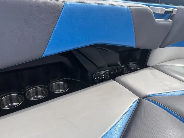 Slide: The Image of Interior of a 2018 Supra SL with blue and gray seats. - 27