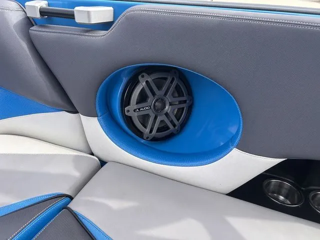 Slide: The Image of Interior of a 2018 Supra SL with blue speaker. - 28