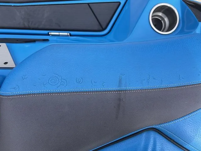 Slide: The Image of Interior of a blue 2018 Supra SL with stylish design. - 33