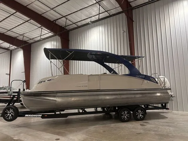 Slide: The Image of 2017 Harris Crowne Series SL 250 pontoon boat in warehouse. - 10