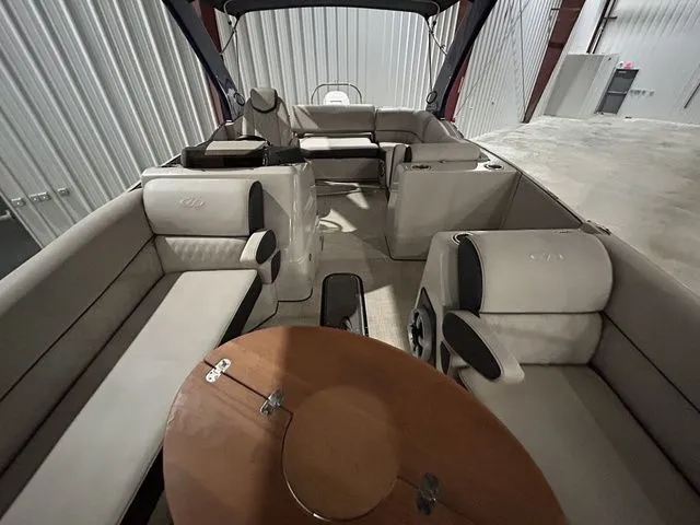 Slide: The Image of Interior of a 2017 Harris Crowne Series SL 250 pontoon boat. - 13
