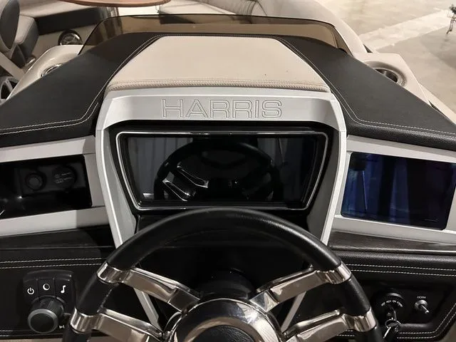 Slide: The Image of Dashboard of a 2017 Harris Crowne Series SL 250 boat. - 21