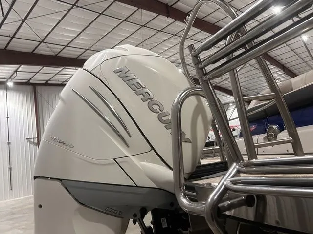 Slide: The Image of 2017 Harris Crowne Series SL 250 with Mercury engine in warehouse. - 5