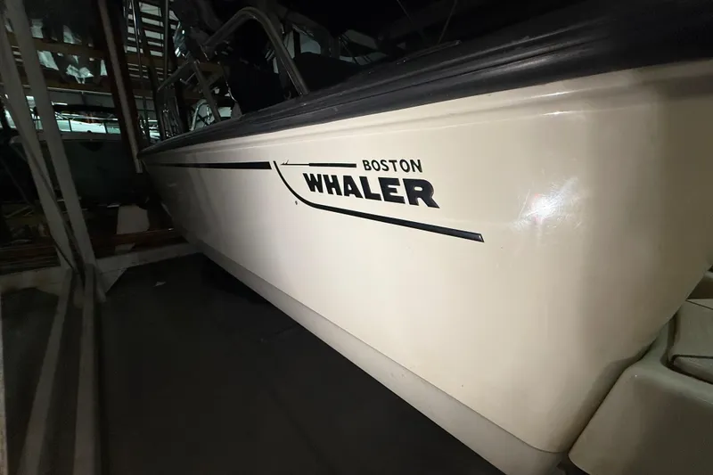 Slide: The Image of 2020 Boston Whaler 170 Montauk boat in storage, side view. - 14