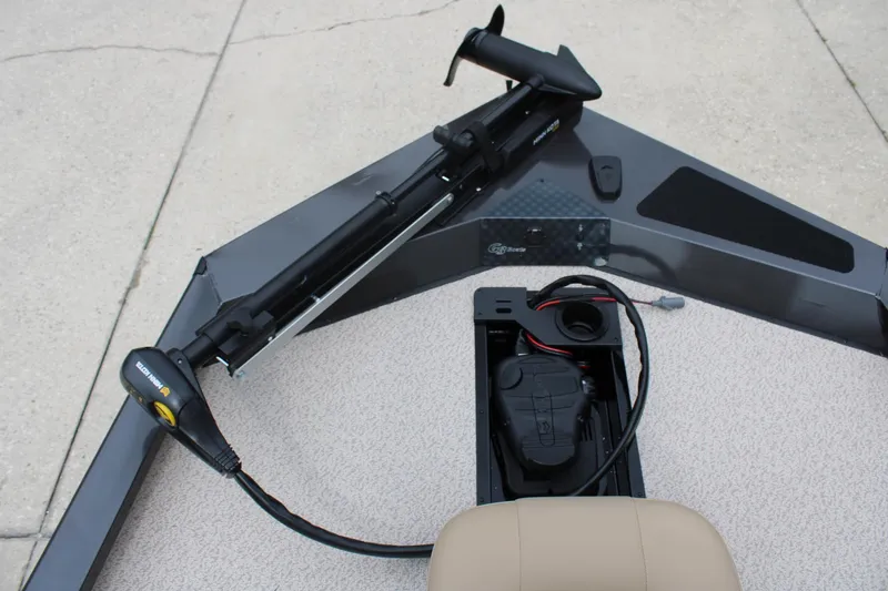 Slide: The Image of 2025 G3 Sportsman 1610 boat with trolling motor and battery compartment. - 12