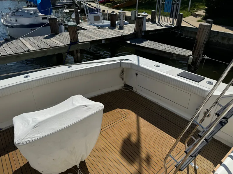 Slide: The Image of Bertram 54 Convertible 1986, boat dock, sunny day. - 30