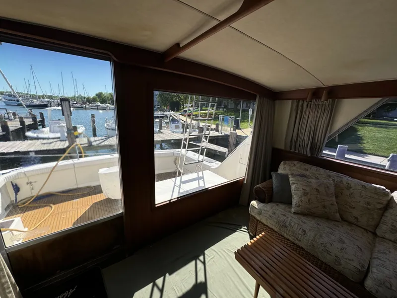 Slide: The Image of Interior of a 1986 Bertram 54 Convertible yacht at the marina. - 32