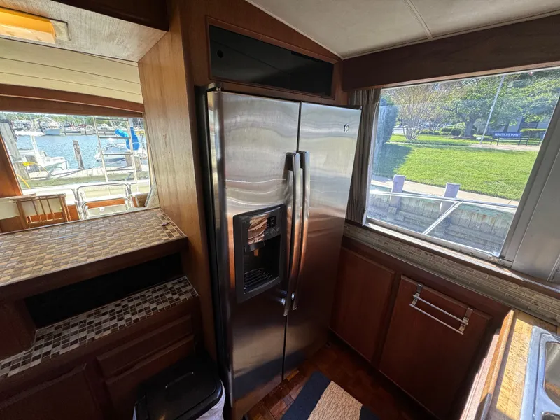 Slide: The Image of Interior of 1986 Bertram 54 Convertible yacht featuring modern kitchen. - 42