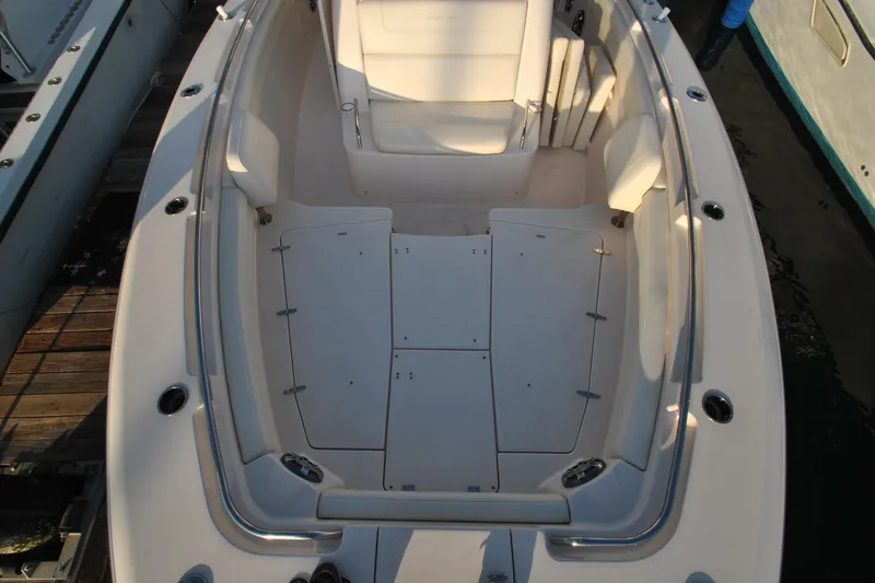 Slide: The Image of 2021 Grady-White Canyon 336 boat interior, featuring spacious seating and sleek design. - 23