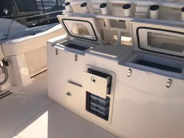 Slide: The Image of 2021 Grady-White Canyon 336 with fishing rod holders and storage. - 34