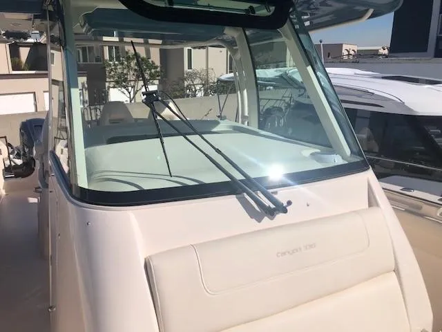 Slide: The Image of 2021 Grady-White Canyon 336 boat with modern windshield. - 37