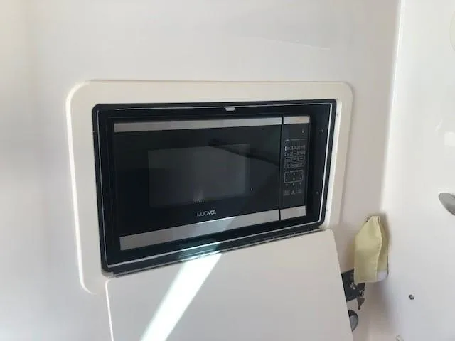 Slide: The Image of Microwave in 2021 Grady-White Canyon 336 boat. - 41