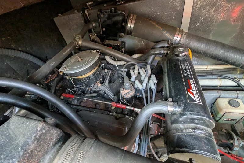 Slide: The Image of Engine compartment of a 1987 Sea Ray 390 Express Cruiser with MerCruiser components. - 46