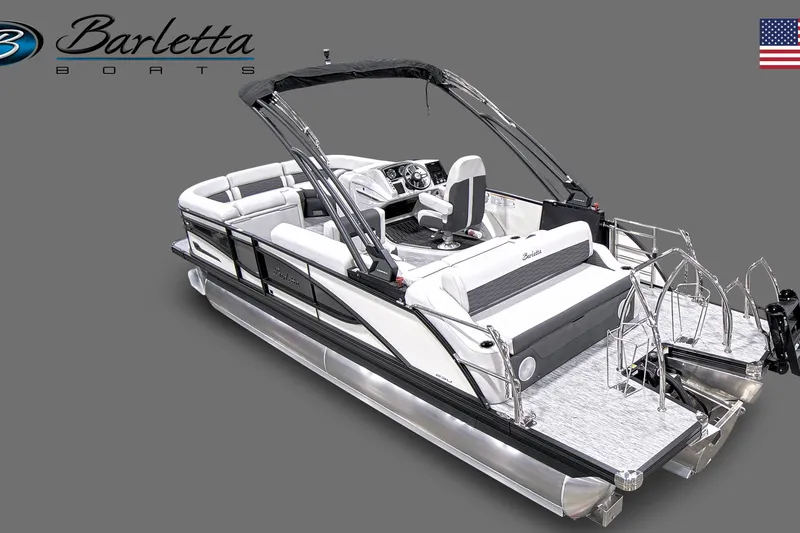 Slide: The Image of 2023 Barletta Corsa pontoon boat with sleek design and luxurious features. - 1