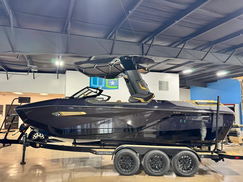 The Image of 2026 Nautique Super Air Nautique G23 Paragon in a showroom. - 1