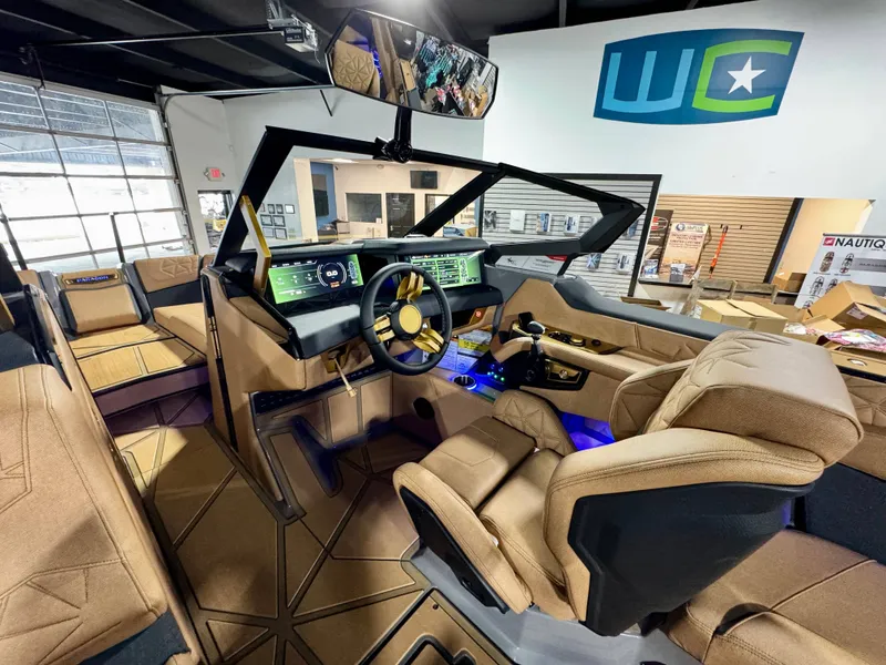 Slide: The Image of Interior of the 2026 Nautique Super Air Nautique G23 Paragon boat. - 10