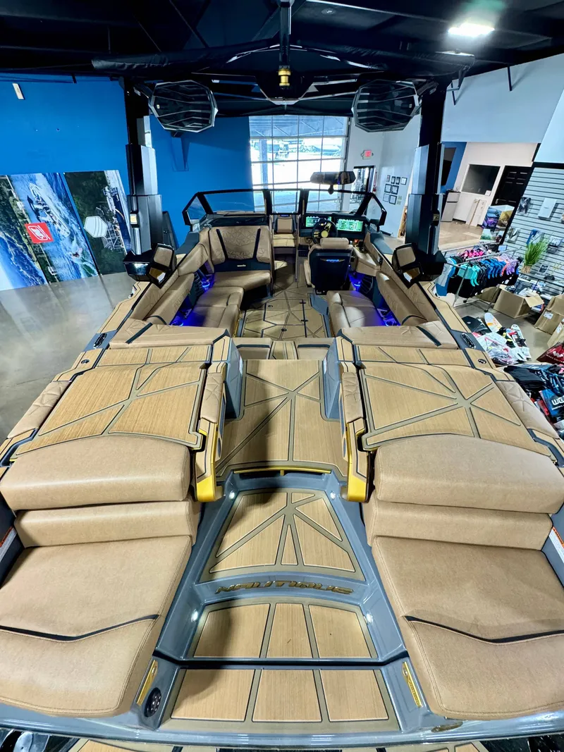 Slide: The Image of Interior of the 2026 Nautique Super Air Nautique G23 Paragon boat. - 6