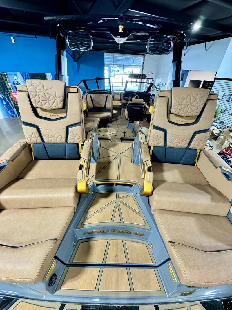 Slide: The Image of Interior of the 2026 Nautique Super Air Nautique G23 Paragon boat. - 7