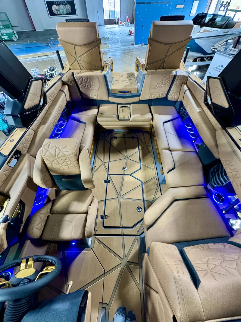 Slide: The Image of Luxurious interior of the 2026 Nautique Super Air Nautique G23 Paragon. - 8