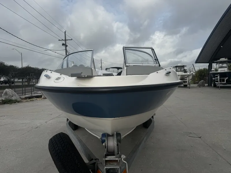 Slide: The Image of 2011 Bayliner 184 boat on trailer, front view. - 12