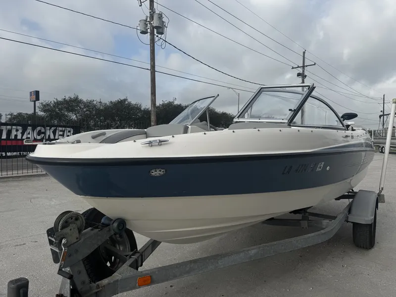 Slide: The Image of 2011 Bayliner 184 boat on trailer, side view. - 4