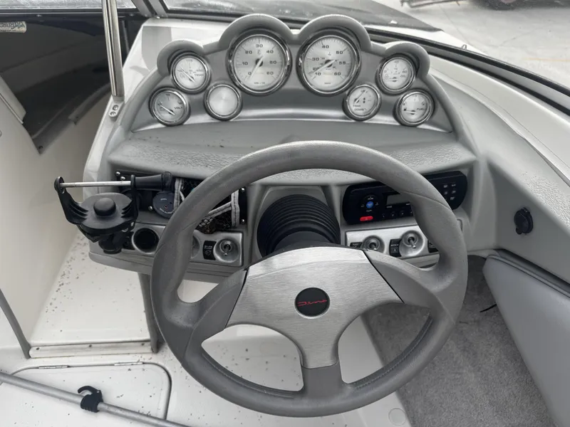 Slide: The Image of 2006 Stratos 285 Pro XL boat with Yamaha engine, American flag. - 6