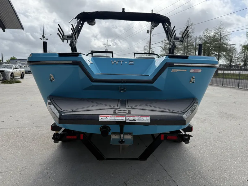 Slide: The Image of Rear view of a blue Heyday WT-2DC boat, 2023 model. - 11