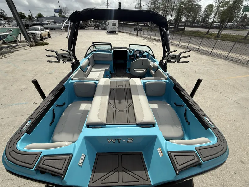 Slide: The Image of 2023 Heyday WT-2DC boat with blue interior and seating. - 3