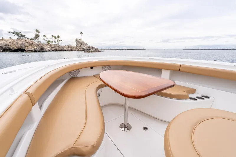 Slide: The Image of Luxurious seating area on 2015 Mag Bay 33 CC boat with ocean view. - 18