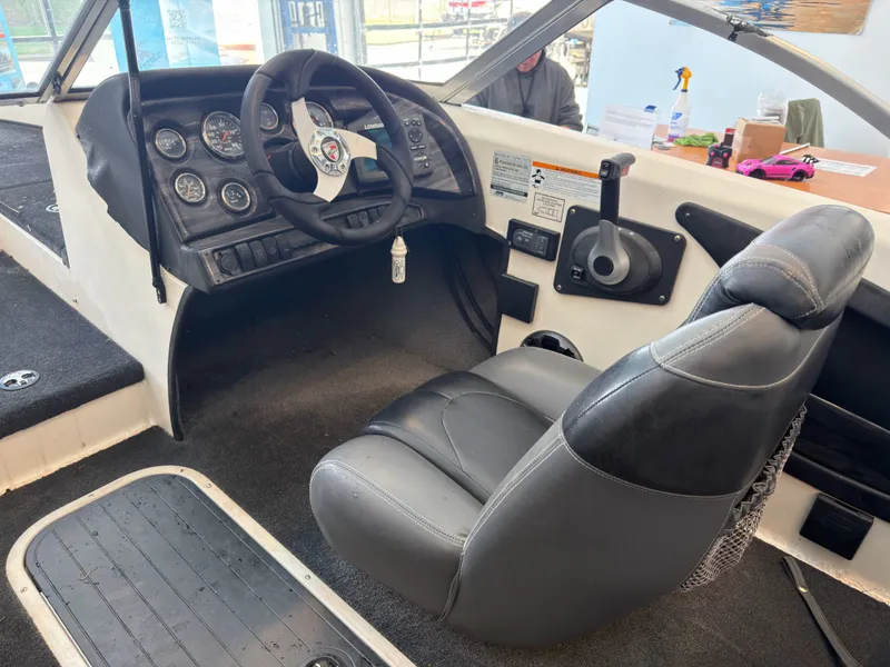 Slide: The Image of Interior of a 2015 Triton 210 Escape boat. - 13