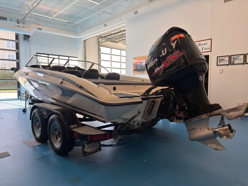 Slide: The Image of 2015 Triton 210 Escape boat with Mercury Pro XS engine. - 14