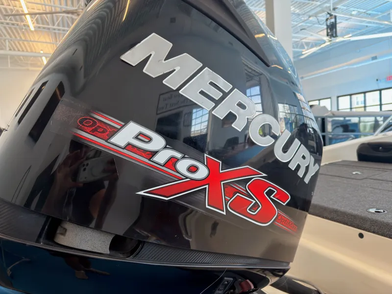 Slide: The Image of Mercury Pro XS outboard motor on Triton 210 Escape boat, year 2015. - 17