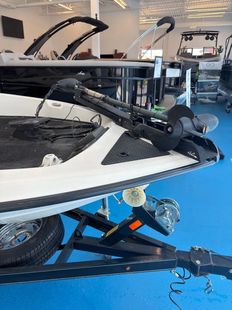 Slide: The Image of Triton 210 Escape 2015 boat with trailer in showroom. - 21