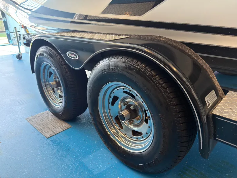 Slide: The Image of Triton 210 Escape 2015 boat trailer with dual suspension. - 28